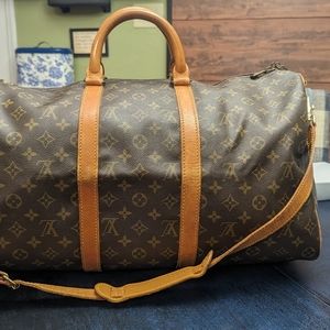 Authentic Louis Vuitton bandolier 50